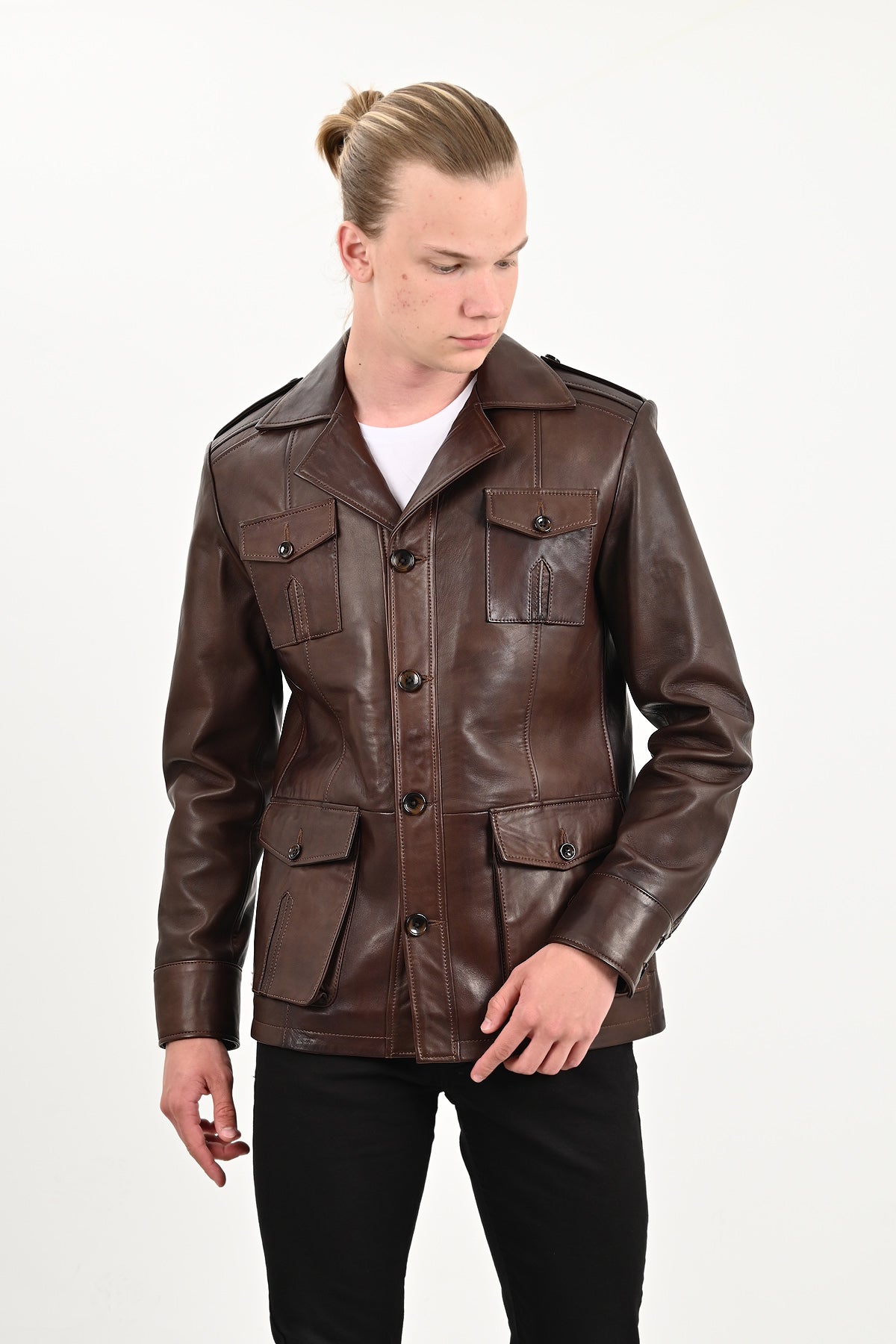 Man wearing a brown leather jacket on a white background, Harrison